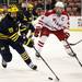 Michigan junior right wingman Derek DeBlois handles the puck in the game against Miami on Saturday, March 23. Daniel Brenner I AnnArbor.com